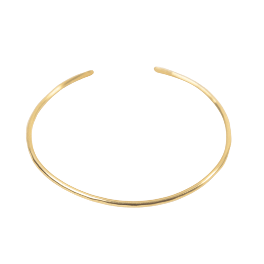 Hammered Brass Bangle, a classic, minimalist design, on white background