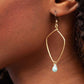 Closeup of woman's ear with Kayah Li Hammered Brass and Amazonite Earrings - Forai