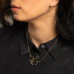 Young woman in black blouse wearing Zomi Circles of Unity Earrings and Necklace in 14k Gold Filled.