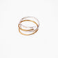 Hand-Hammered Wrap Ring in Brass stacked with sterling silver wrap ring