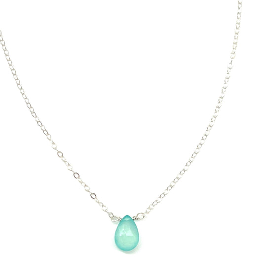 Woman wearing Aqua Chalcedony Teardrop Necklace  and Hoop Earrings in Sterling Silver 